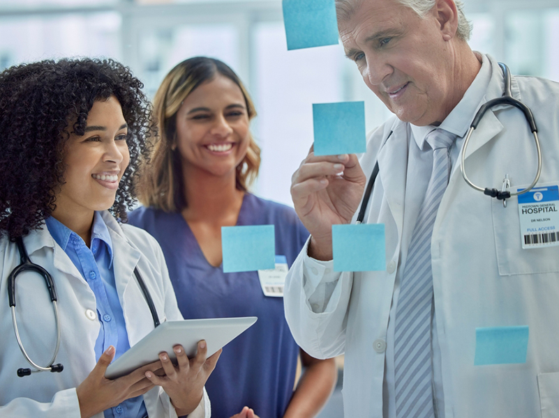 Planning,,Training,And,Doctors,Teamwork,On,Glass,Board,For,Healthcare