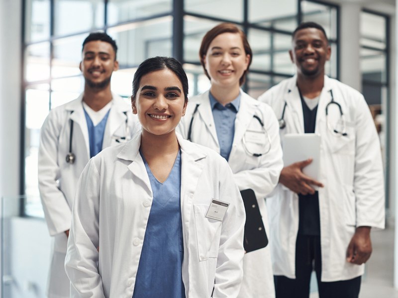 Doctors,,Smile,And,Portrait,In,Hospital,Standing,Together,For,Healthcare,